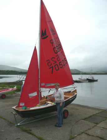 Commodore's wife Elaine naming the craft with a sparing dowsing of champagne